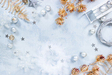 Christmas  background with assorted ornaments, balls, wreath in white and silver color
