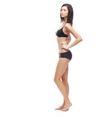 Woman, portrait and full body in underwear on mockup to lose weight or diet against a white studio background. Young attractive female person or slim model posing in lingerie for health and wellness