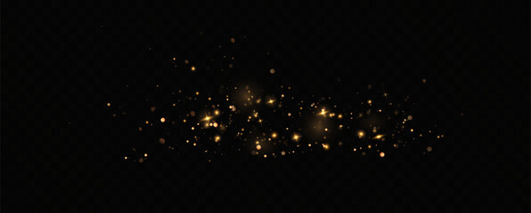 Golden sequins glow with many lights. Glittering dust. Luxurious background of golden particles.