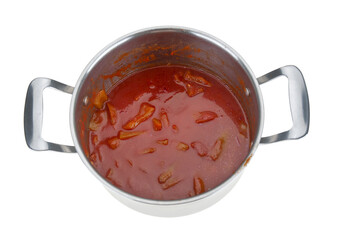 Stewed peppers with sauce in steel saucepan on white background
