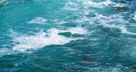 Fototapeta na wymiar Abstract blue ocean water nature background.Sea water texture for design.Selective focus.