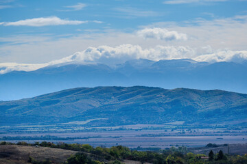 Sunny day in Autumn, trees with yellow orange, red leaves