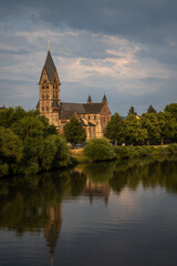 Fototapeta na wymiar Catholic Church of Saint Paul Hanau Germany at the Riverside of River Main