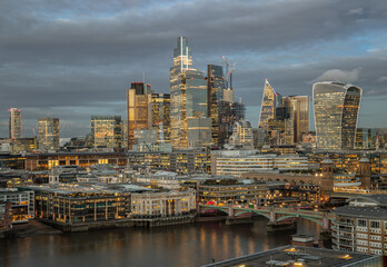 Aerial view of The skyscrapers in the business district of London with the River Thames on...