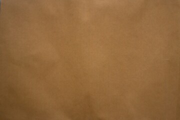 For the design background brown corrugated cardboard texture background. Brown paper cardboard with soft color. Brown corrugated cardboard texture is useful as a background.
