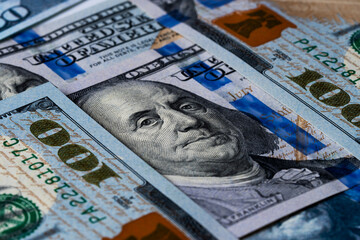 Benjamin Franklin's look on a hundred dollar bill. Benjamin Franklin portrait macro usa dollar...