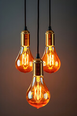 A bunch of isolated Vintage light bulbs hanging from a ceiling.
