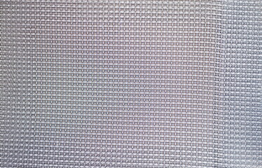 Gray background with interlacing horizontal and vertical stripes closeup