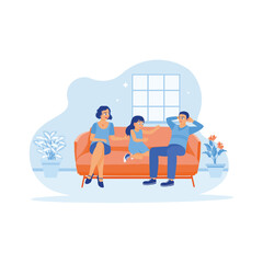 Happy little family sitting together on the sofa. The little girl is thrilled playing with her parents at home on the weekend. A couple of sunny, funny parents concepts. 