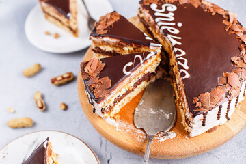Snickers cake with caramel, peanuts and buttercream.