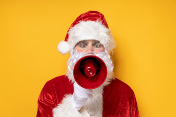 Santa Claus, with a megaphone in his hands.
