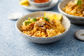 Chicken with couscous and avocado - obrazy, fototapety, plakaty