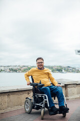 A man breathes sea air by the sea