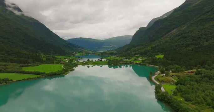 Picturesque Oldevatnet Lake with emerald green water in Oldedalen valley. Drone