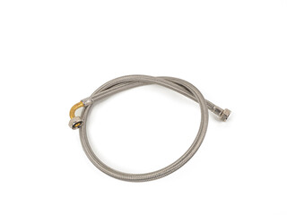Closed braided texture of stainless steel flexible hose. Flexible braided water hose on an isolated white background.