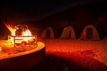 Tented Camp in the desert night scene - obrazy, fototapety, plakaty