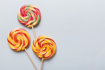 Set of colorful lollipops on colored background. Summer concept. Party Happy Birthday or Minimalist Concept