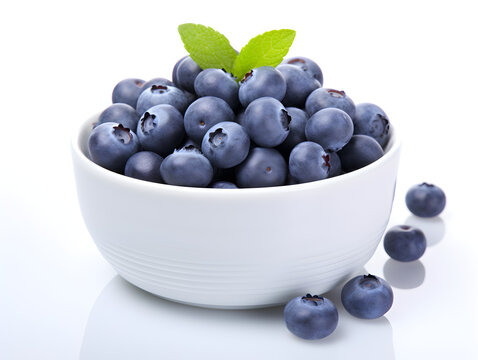 Fresh ripe blueberries in a white bowl isolated on white background 