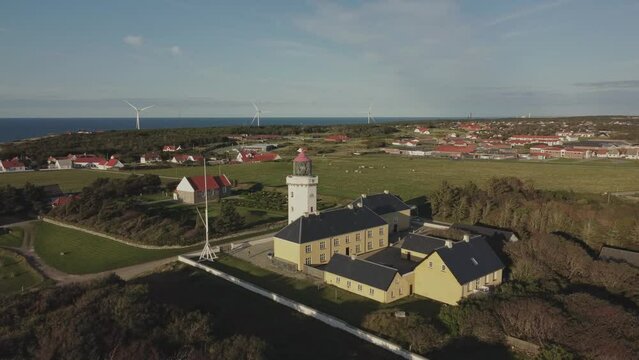 Hanstholm Fyr, Thisted, Denmark - Lush Foliage Envelops the Lighthouse - Drone Orbit