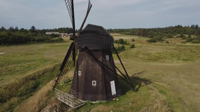 Faddersbol Molle, Thisted, Denmark - An Observation of a Vintage Windmill - Aerial Pullback Shot