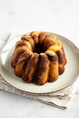 Homemade Marble Cake on a Plate, side view.