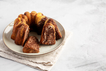 Homemade Marble Cake on a Plate, side view.