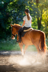  woman riding a horse