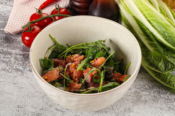Salad with salmon and arugula