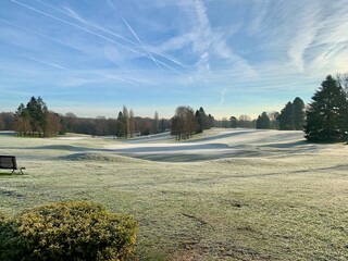 Sub zero frozen golf course in Belgium sunrise