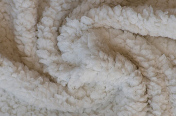 White soft plush lamb wool fabric background