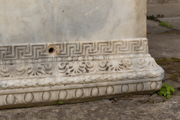 Old plaster sculptures and bas-reliefs, wall texture and patterns. Elements of architectural decorations of buildings. On the streets in Istanbul, public places.