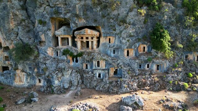Ancient Lycian rock tombs in Pinara ancient city, Fethiye - Turkiye.