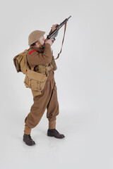 The man is an actor in vintage military uniform of the American soldier, period World War I, 1914-1918