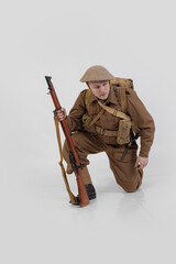 The man is an actor in vintage military uniform of the American soldier, period World War I, 1914-1918