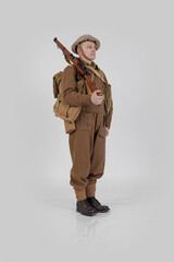 The man is an actor in vintage military uniform of the American soldier, period World War I, 1914-1918