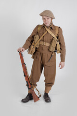 The man is an actor in vintage military uniform of the American soldier, period World War I, 1914-1918