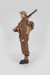 The man is an actor in vintage military uniform of the American soldier, period World War I, 1914-1918