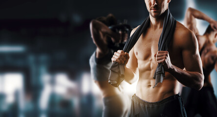 Fit muscular man working out at the gym - Powered by Adobe