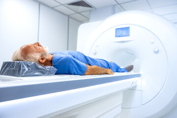 MRI hospital diagnostic center with patient laying down ready for full body scan examination. - obrazy, fototapety, plakaty