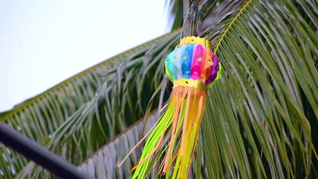 Colorful modern lantern Akash Kandil decorative lampa hang out at house balcony for celebrating Diwali Festival, Happy diwali