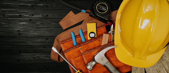 Construction tools lined up on a wooden table Prepared for use.