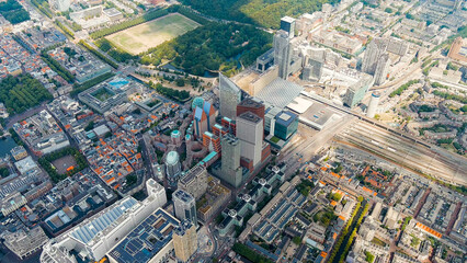 The Hague, Netherlands. Business center of The Hague. Large train station Den Haag Centraal. Cloudy weather. Summer day, Aerial View
