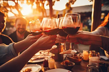 Crédence de cuisine en verre imprimé Vignoble Happy friends having fun outdoor. Group of friends having backyard dinner party together. Young people sitting at bar table toasting wine glasses in vineyards garden