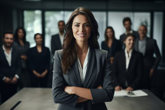 Female CEO confidently leading diverse boardroom meeting in office Women in top executive positions