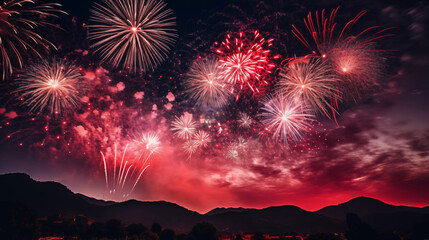 Tło na życzenia - fajerwerki na niebie w Sylwestrową noc - huczne świętowanie. Szczęśliwego...