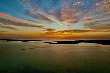 The drone photos of a beautiful sunset at Dunedin Causeway Beach, Tampa Bay, Florida.