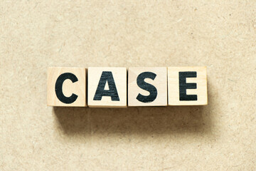 Alphabet letter block in word case on wood background