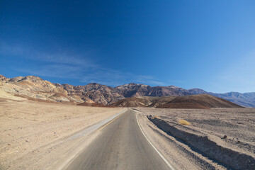 Fototapeta na wymiar One lane road through Death Valley National Park, California