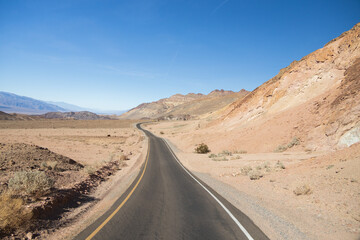 Fototapeta na wymiar One lane road through Death Valley National Park, California