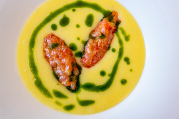 Potato Puree with Shrimp on a White Plate in Switzerland.